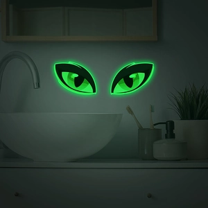 Stickers muraux yeux verts lumineux pour salle de bain brillant dans le noir