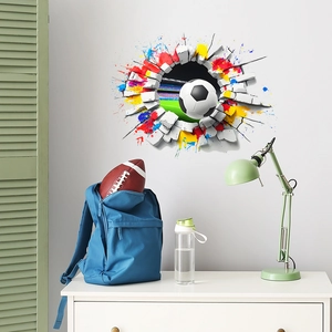 3D football wall sticker breaking through a white brick wall for home sports decor