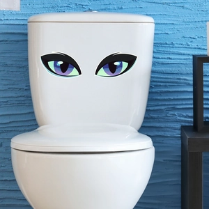 Cartoon blue eyes toilet sticker on white tank with dark blue wall background