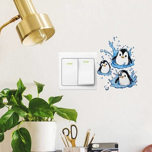Cute cartoon penguin wall stickers decorating a bedroom light switch with blue water splashes