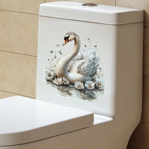 Detail of elegant white swan and flower toilet sticker with rhinestone accents on ceramic