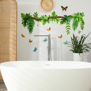 Tropical green vine wall sticker with colorful butterflies for home decor in a bathroom setting