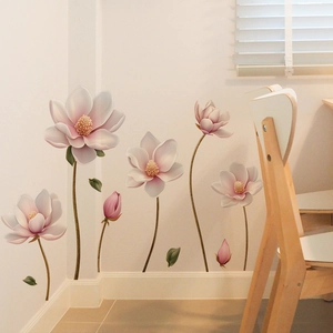Macro detail of magnolia wall stickers featuring embossed pink flowers and green leaves
