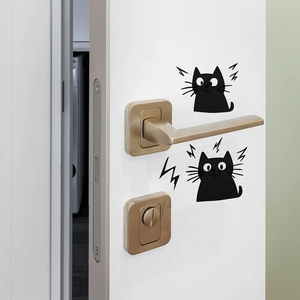 Minimalist black cat wall stickers on white door for home bedroom and living room decor