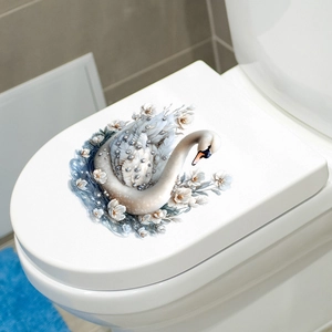 Close-up of elegant white swan toilet seat sticker with 3D floral details and pearls