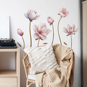 Detailed pink magnolia flower wall decal set with floral blossoms on white bedroom wall