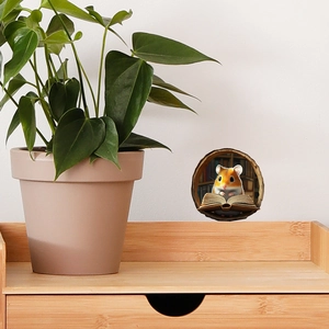 Detailed view of 3D cartoon hamster reading a book wall sticker on a white home wall