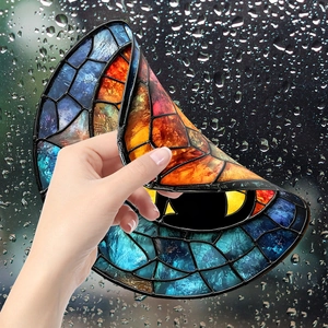 Creative black cat round stained glass window sticker being peeled for balcony decoration