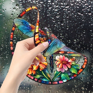 Detail of colorful dragonfly stained glass window film showing static cling feature