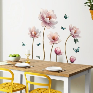 Detail of pink magnolia flower wall stickers and blue butterflies in a dining room