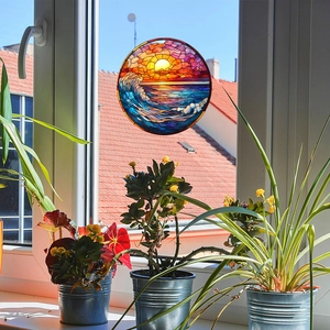 Sunset wave suncatcher window sticker with vibrant colors and artistic glass design