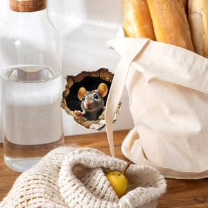 Detailed view of 3D mouse hole wall sticker in a cozy home kitchen background