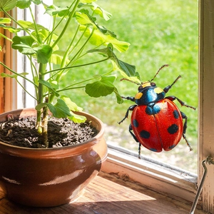 Realistic 3D ladybug window sticker with vibrant red and blue shell for home decor