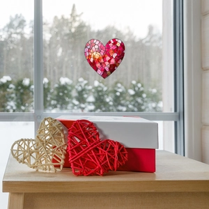 Stained glass heart suncatcher decor for window featuring vibrant colorful mosaic patterns