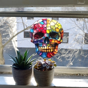 Colorful mosaic skull window sticker with sunlight transparency on glass window