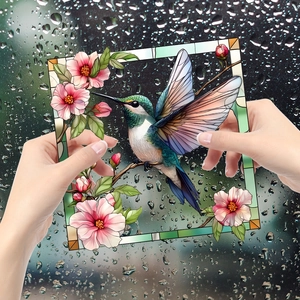 Stained glass hummingbird and pink floral window cling with translucent texture