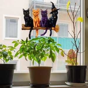 Sticker fenêtre Halloween avec quatre chats mignons sur un balai pour décor de vitre