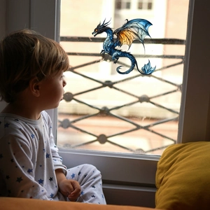 Colorful dragon stained glass window decal for home decor featuring a flying blue dragon