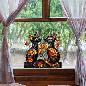 Mosaic glass window film with black cats and orange flowers in a wooden frame