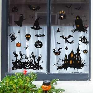 Halloween window clings set featuring bats pumpkins and haunted castle silhouette stickers