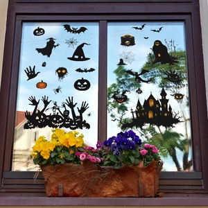 Halloween window stickers set featuring black pumpkin, bat, and haunted house silhouettes