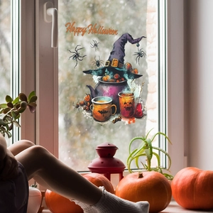 Halloween static window cling with purple witch hat and pumpkin on a home glass pane