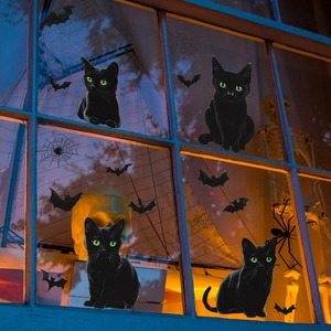 Halloween static window clings featuring black cats with green eyes and bat decorations