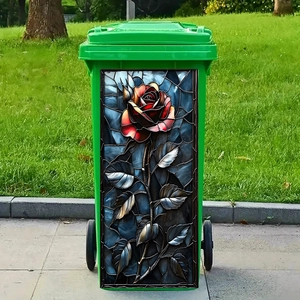 Self-adhesive stained glass rose flower sticker on a green outdoor wheeled trash bin