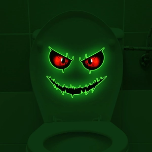 Luminous Halloween toilet sticker with glowing ghost face and red eyes on dark wall