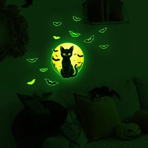 Luminous Halloween wall decals featuring a black cat, glowing moon, and green bats stickers
