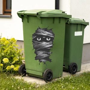 Halloween mummy eyes sticker decoration for large green outdoor trash bin and waste container