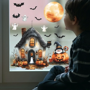 Halloween static window clings featuring a haunted house, full moon, bats and ghosts set