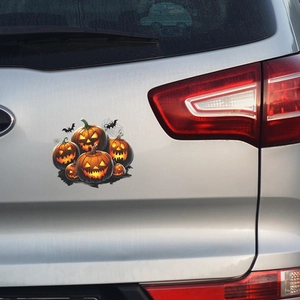 Halloween car stickers with orange pumpkin, black bat and spider web on silver car trunk