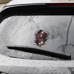 Halloween car decal featuring a red hair skull with realistic broken window glass effect