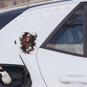 3D Halloween car sticker featuring a red-haired skull breaking through white car body