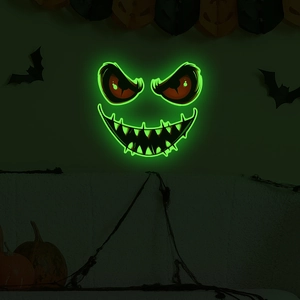 Green glowing Halloween monster wall decals with scary eyes for festive home decoration