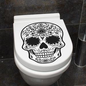 Halloween sugar skull wall sticker for home decor with festive floral pattern on white surface