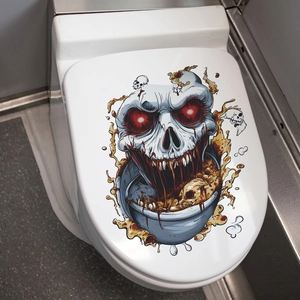 Spooky skull toilet lid sticker for Halloween decor featuring glowing red eyes design