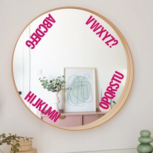 Modern round wall mirror with light wood frame for Nordic home decor and wall art stickers