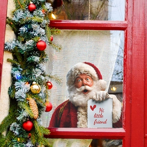 Festive Santa Claus static window cling with Hi little friend sign and holiday pine decor