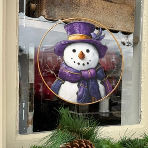 Festive round snowman window suncatcher with golden frame and purple scarf for home decor