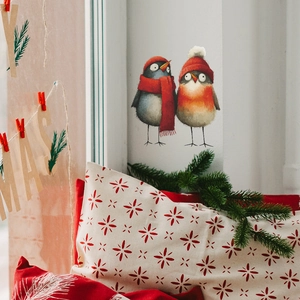 Christmas window decals with cute cartoon birds in red scarves on glass background