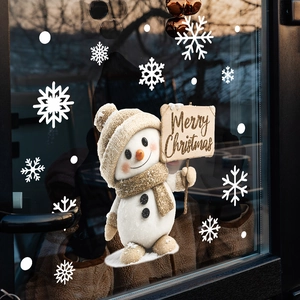 Cartoon snowman with Merry Christmas sign and white snowflake stickers for window decor