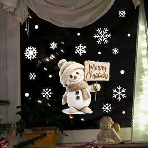 Cute snowman with Merry Christmas sign and white snowflakes for window decoration