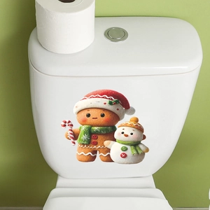 Christmas toilet decals featuring cartoon gingerbread man and snowman festive decorations