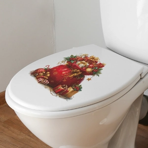 Christmas toilet lid sticker featuring a festive red gift bag and golden bow decoration