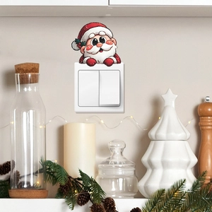 Cartoon Santa Claus decorative sticker for wall light switch in a cozy Christmas setting