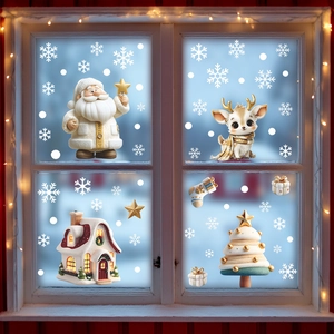 3D Christmas window stickers with Santa, reindeer, and snowflakes on glass window panes