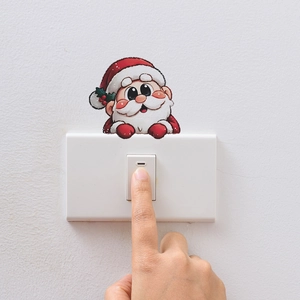 Cartoon Santa Claus wall sticker for home switch decoration in festive living room setup