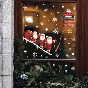 Christmas Santa Claus window stickers with white snowflakes for festive glass decoration